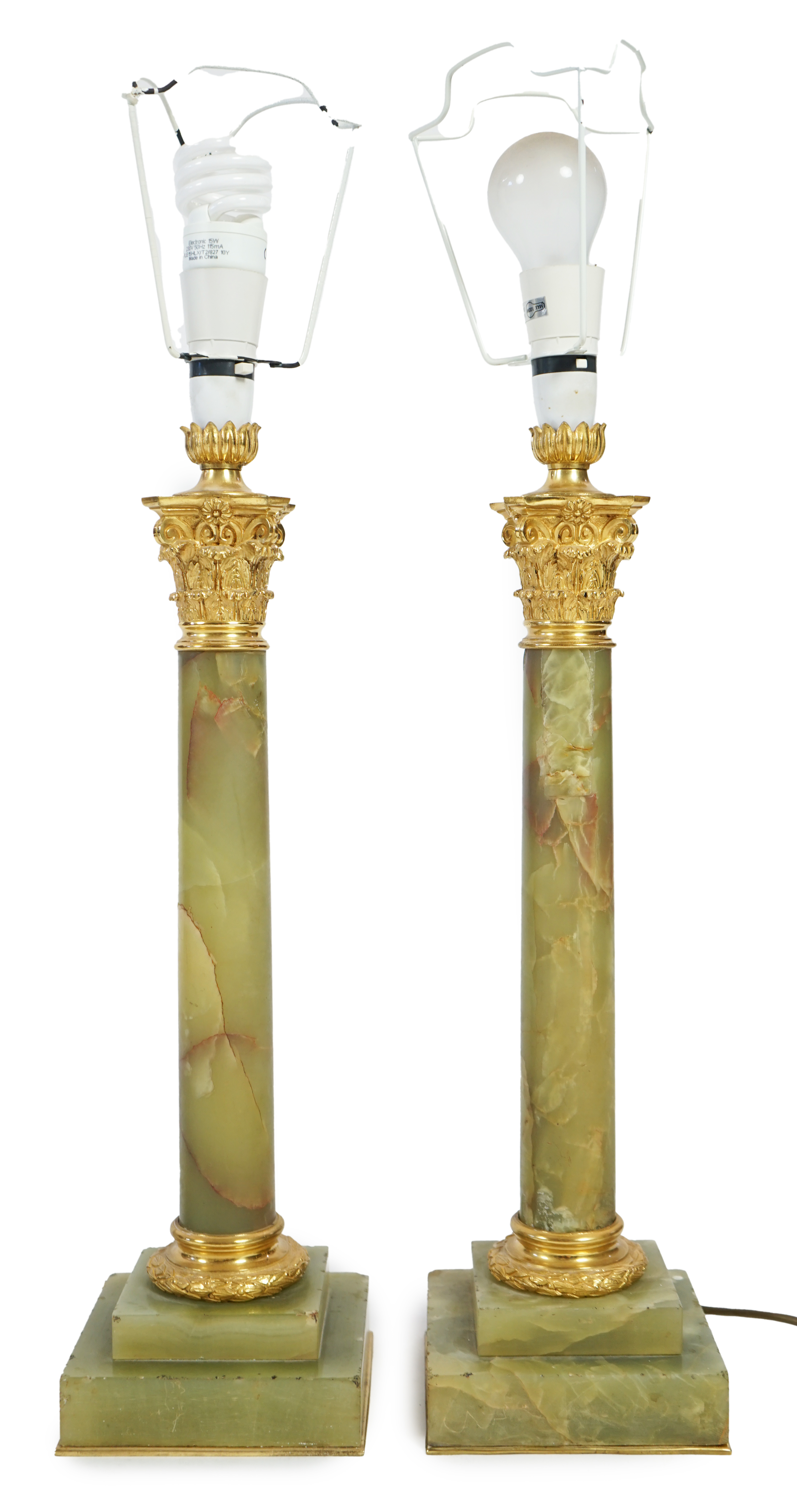 A pair of Victorian ormolu mounted green onyx table lamps